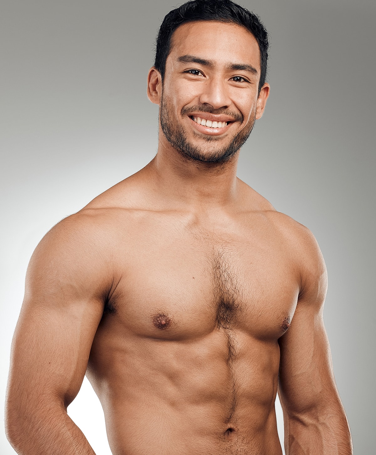 Charlotte, NC gynecomastia surgery model with muscular physique and short hair.