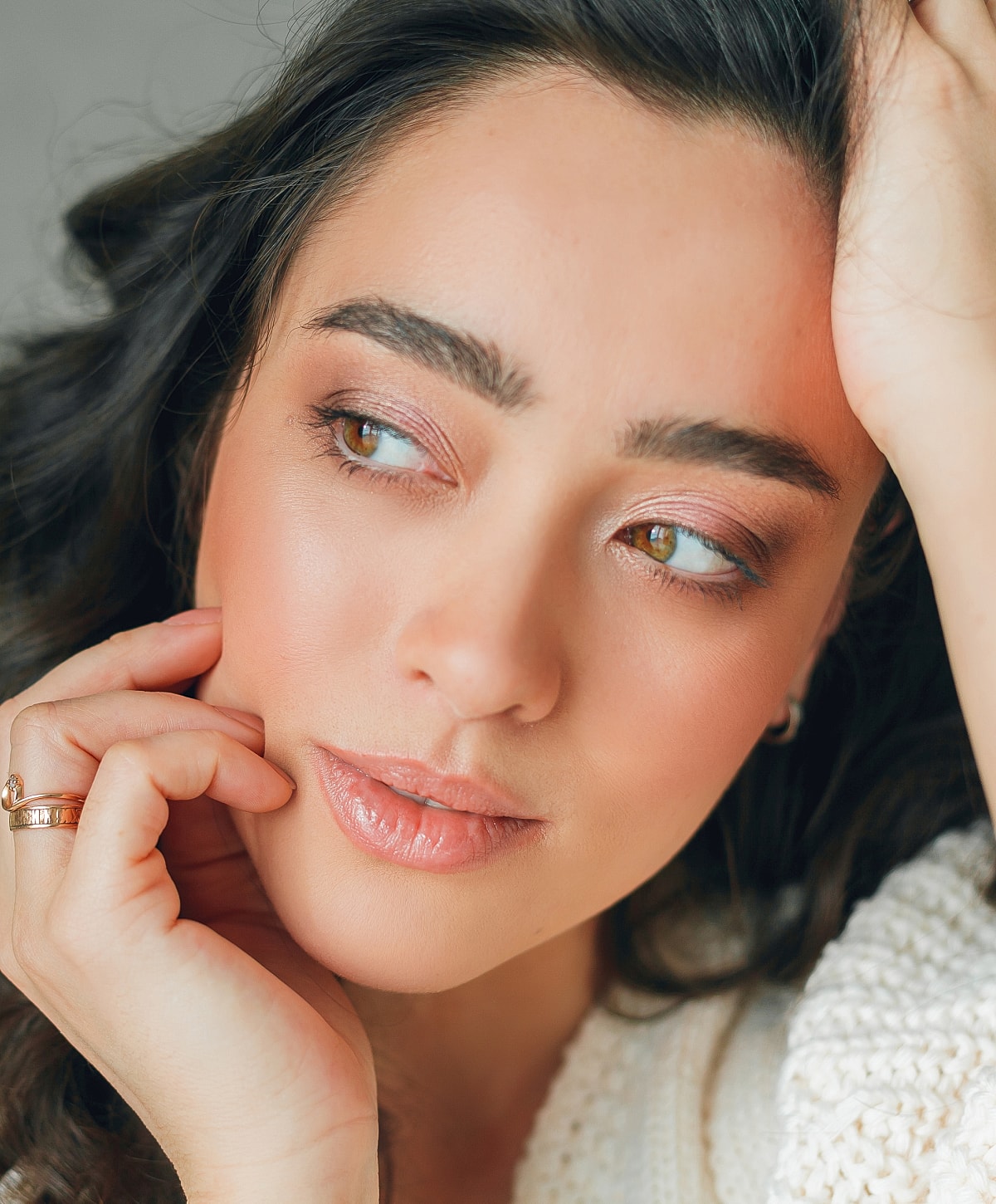 Charlotte, NC blepharoplasty model with soft expressions.