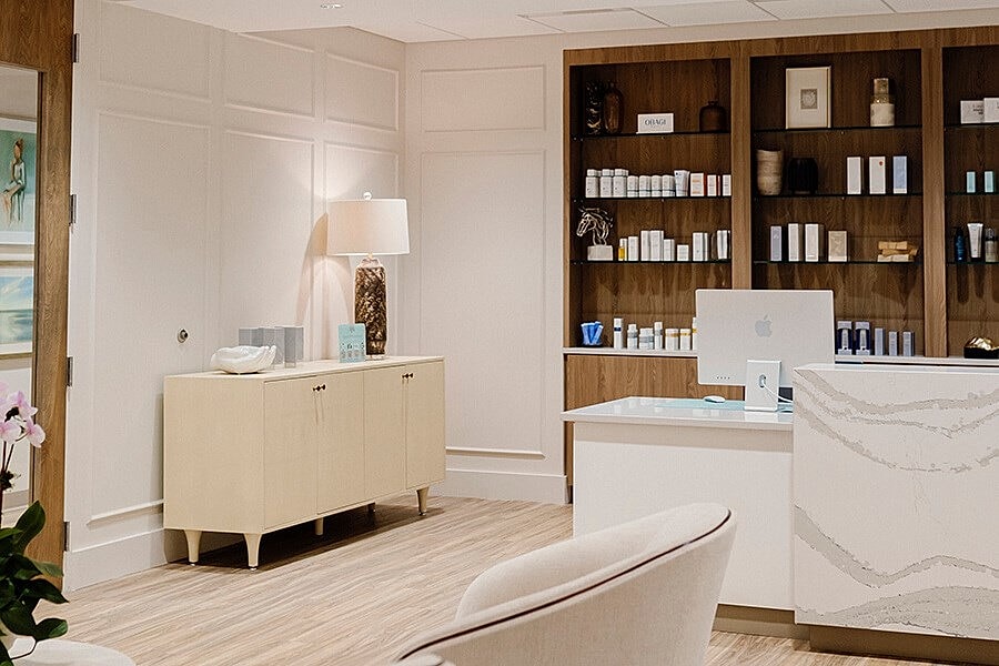 Elegant spa reception area with skincare products.